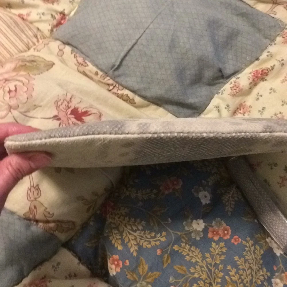 Gili pebble leather snow leopard wristlet